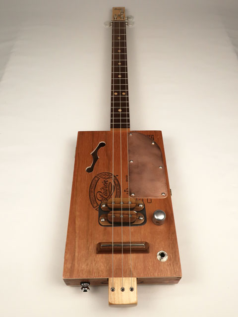 Cigar box guitar with humbucker and copper pick guard. Padron 3 string made by Mike Snowden.