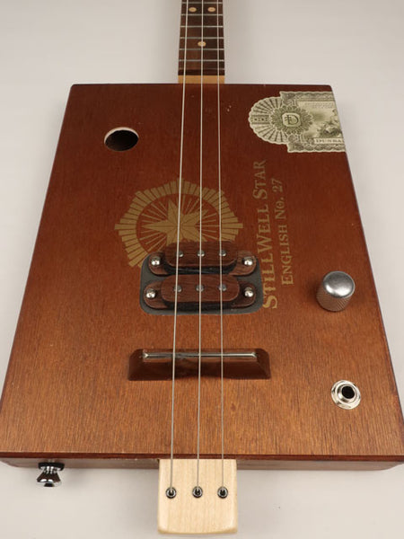 Front view cigar box guitar stillwell star 3 string. This cigar box guitar is handmade by Mike Snowden.