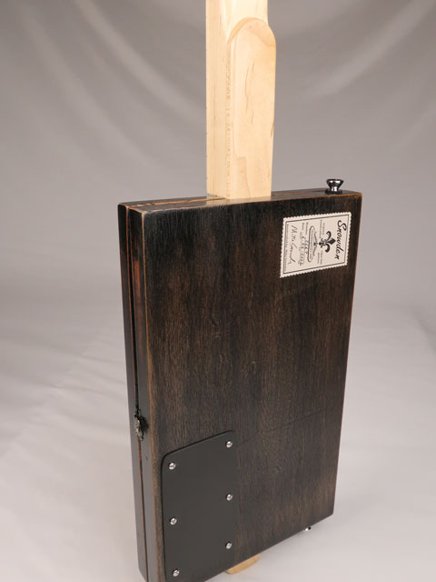 Backview of a 3 string cigar box guitar with a humbucker pickup. Handmade by Mike Snowden of Snowden Guitars.