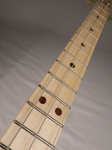 Front view of a 3 string cigar box guitar neck with a maple fretboard and walnut inlay. Handmade by Mike Snowden of Snowden Guitars.