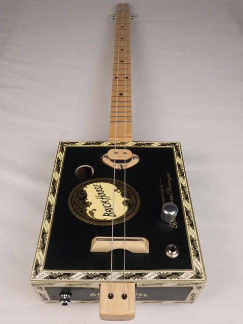 Front view of a 2 string cigar box guitar made with a Brick House cigar box. Handmade by Mike Snowden of Snowden Guitars in Marietta Georgia USA.