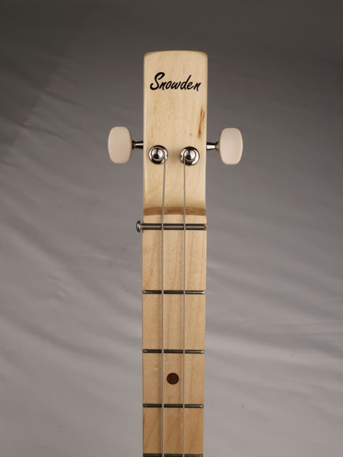 Front view of a 2 string cigar box guitar with a Snowden Guitars logo on the headstock. Handmade by Mike Snowden of Snowden Guitars.