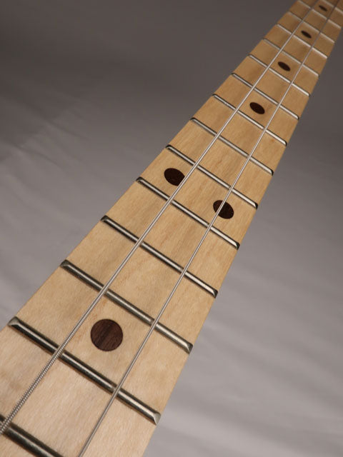 Front view of a 2 string cigar box guitar neck made with walnut inlay and maple fretboard. Handmade by Mike Snowden of Snowden Guitars.