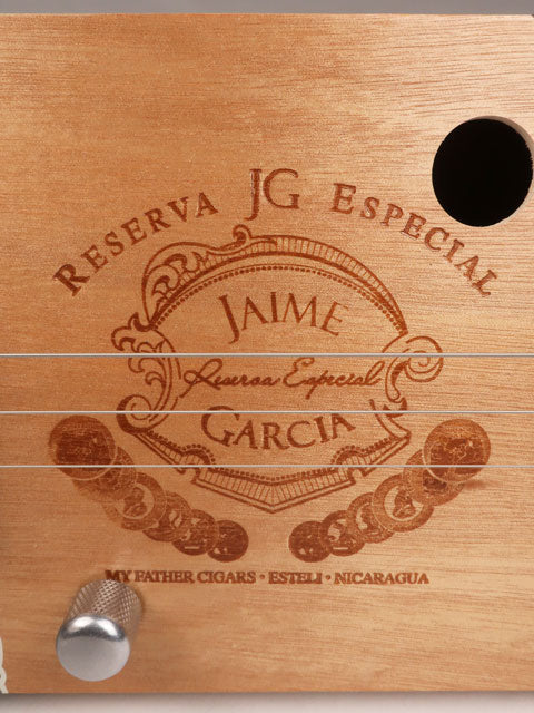 Front close up view of a 3 string cigar box guitar made with a Jaime Garcia cigar box. Handmade by Mike Snowden of Snowden Guitars.