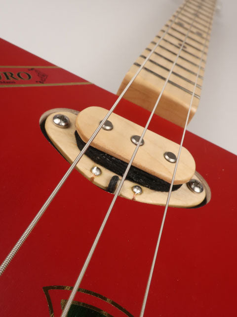 Front view of The Wise Man 3 string cigar box guitar handmade by Mike Snowden. This cigar box is made with a red cigar box with The Wise Man printed on the front.