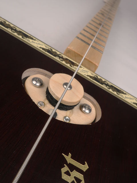 Close up view of a single string cigar box guitar pickup. Handmade by Mike Snowden of Snowden Guitars.