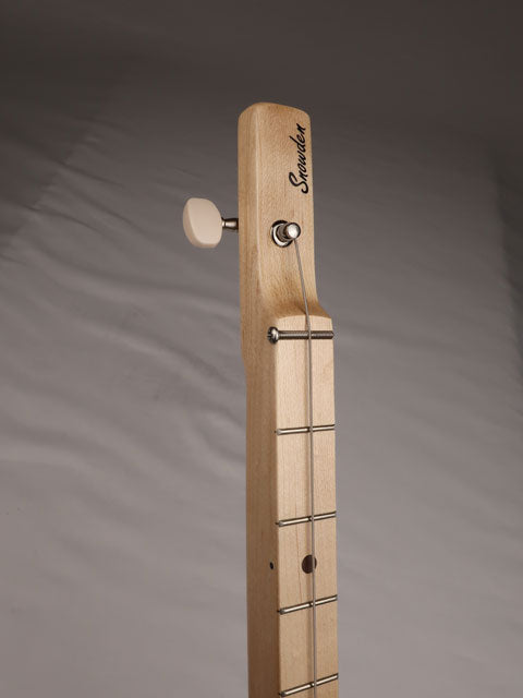 Front view of a one string cigar box guitar handmade by Mike Snowden of Snowden Guitars. The front of the headstock has a Snowden Guitars logo on the front.