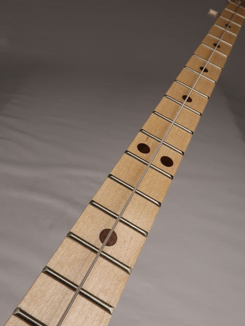 Front view of a one string cigar box guitar neck. Handmade by Mike Snowden of Snowden Guitars.