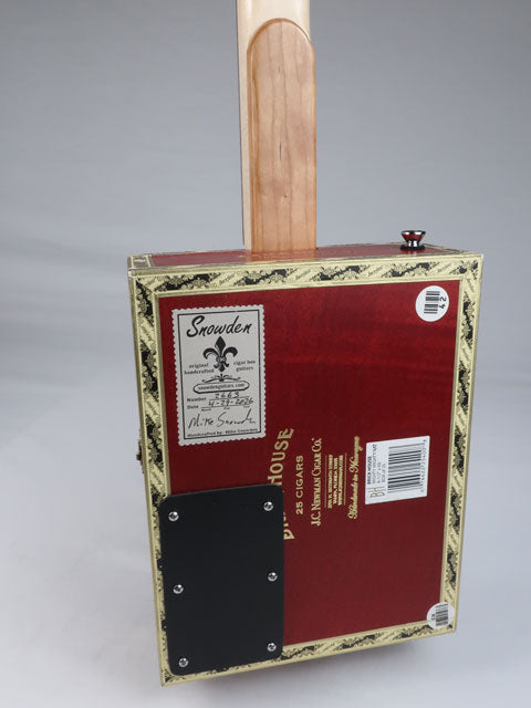 Back tiled view of a 4 string cigar box guitar made with a Brick House cigar box and a walnut single coil pickup. This red cigar box guitar is handmade by Mike Snowden.