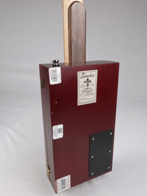 Back view of a cigar box guitar with walnut heel and a Maple neck. This cigar box guitar is handmade by Mike Snowden of Snowden Guitars.