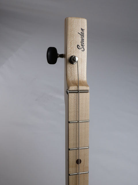 front view of a cigar box guitar headstock with Snowden Guitars logo. This cigar box guitar diddly bow has one sting and a maple neck with a black tuning key.