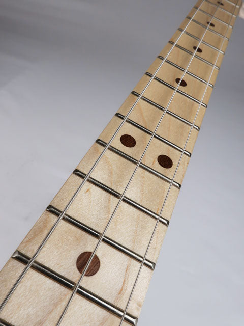 Front view of a 3 string cigar box guitar maple neck with walnut inlay and metal frets. This cigar box guitar is handmade by Mike Snowden of Snowden Guitars.