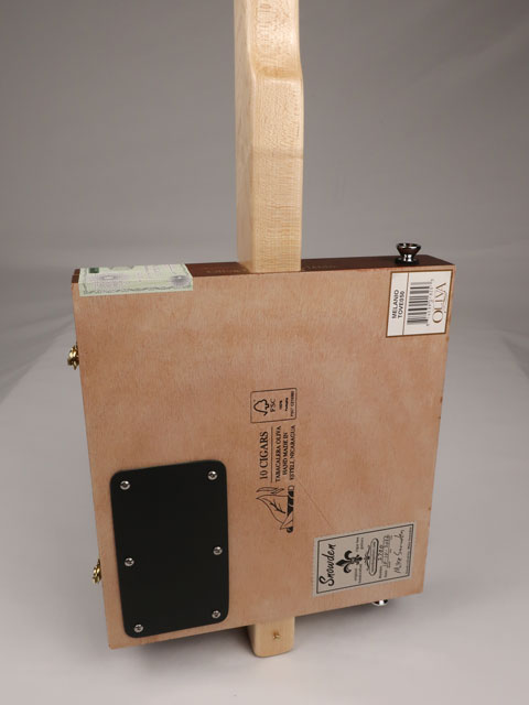 Back view of a one string cigar box guitar diddly bow cbg made with an Oliva cigar box. This cigar box guitar is handmade by Mike Snowden of Snowden Guitars.