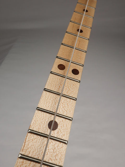 Front view of a one string diddly bow cigar box guitar handmade by Mike Snowden of Snowden Guitars.