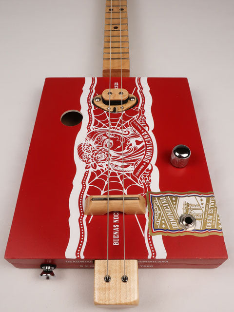 Front view of a 2 string cigar box guitar made with a Deadwood Dominicana cigar box. Handmade by Mike Snowden of Snowden Guitars in Marietta GA USA.