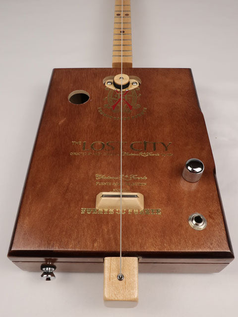 One String diddly bow cigar box guitar CBG handmade by Mike Snowden of Snowden Guitars. This cigar box guitar is handmade with a Lost City cigar box.