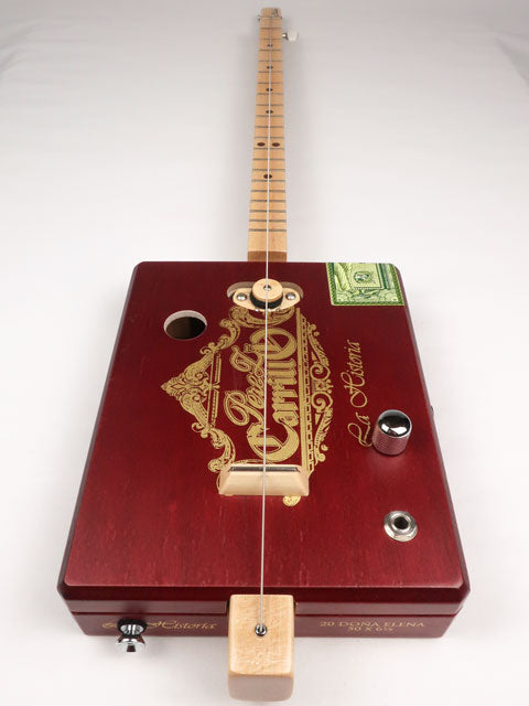 Front view of a one string diddly bow CBG cigar box guitar made with a Perez Carrillo cigar box handmade by Mike Snowden of Snowden Guitars. 