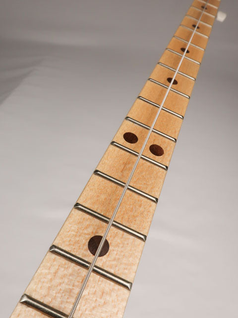 Front view of a one string diddly bow cigar box guitar neck and fretboard. Handmade by Mike Snowden of Snowden Guitars.
