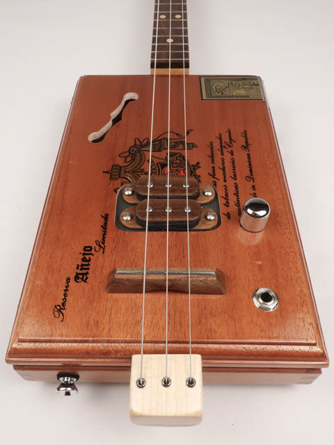 Front view of a 3 string cigar box guitar made with a A Fuente cigar box. This cigar box guitar is made by Mike Snowden of Snowden Guitars. 