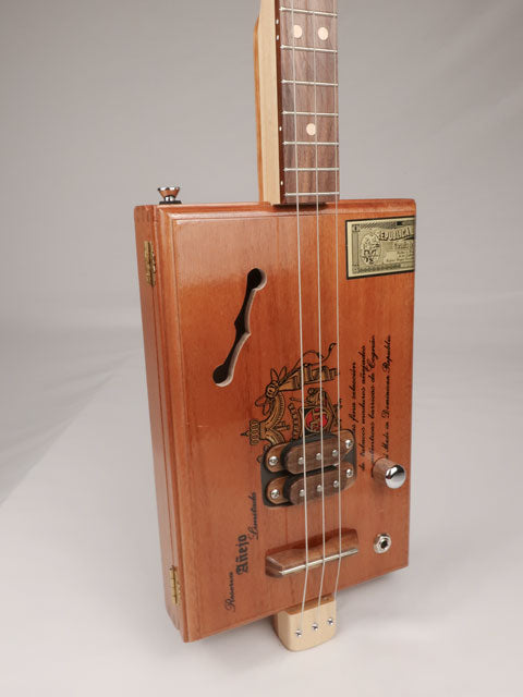 Front view of a 3 string cigar box guitar made with a A Fuente cigar box. This cigar box guitar is made by Mike Snowden of Snowden Guitars. 