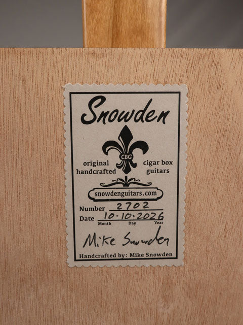 Back view of a 3 string cigar box guitar made with a New Orleans cigar factory cigar box. Handmade by Mike Snowden of Snowden Guitars.