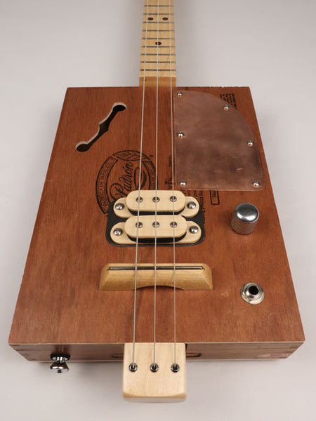Front view of a 3 string cigar box guitar made with a Padron cigar box. Handmade by Mike Snowden of Snowden Guitars.